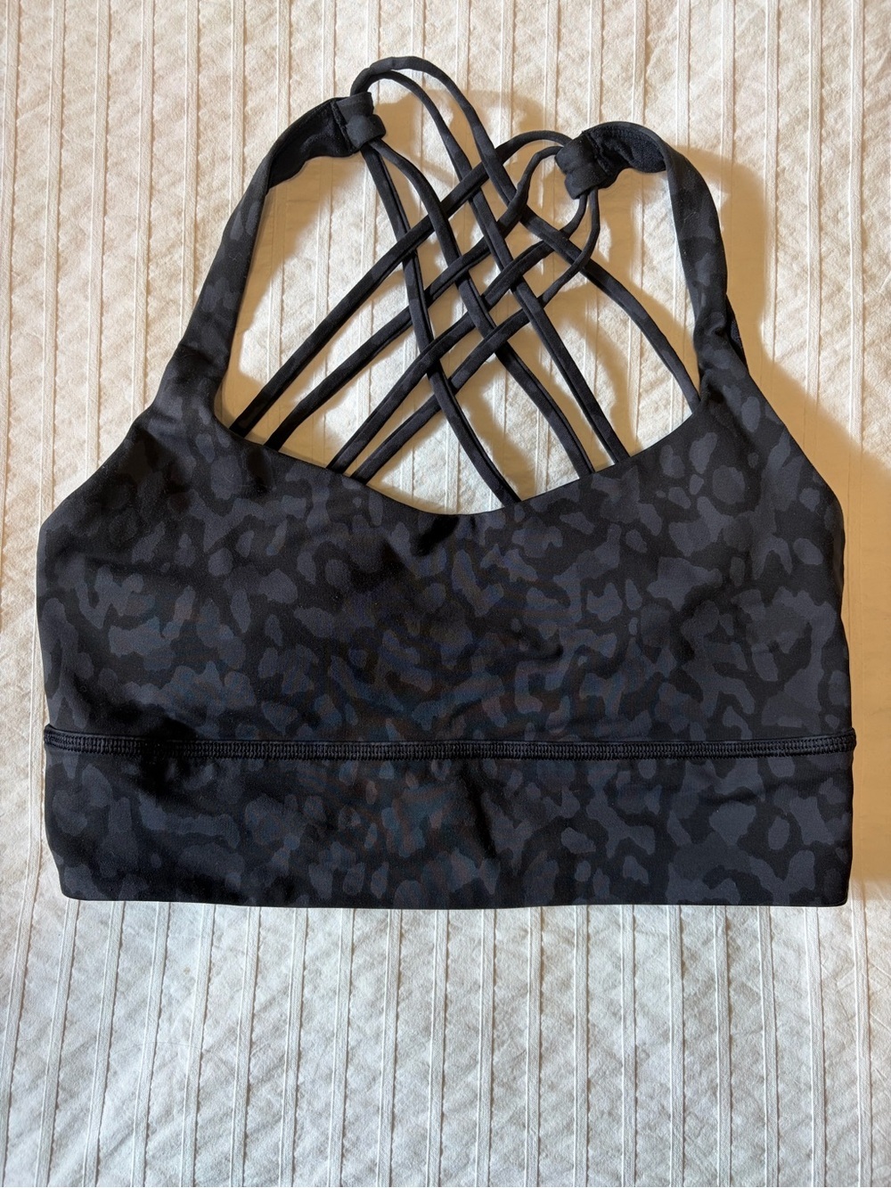 LULULEMON- size 8 Free to Be Bra Wild longline in a black camo print